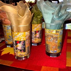 Decorated set of four cocktail glasses with matching napkins
